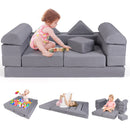 Modular 9-piece kids play couch in grey, convertible for lounging, sleeping, and playing, with machine-washable covers.