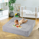 Modular kids foam sofa in grey, perfect for creative play, reading, and napping in a child's room.