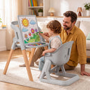 Child using the Costway 7-in-1 high chair for drawing and play
