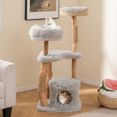 Tall wooden cat tree with jute scratching posts, featuring multiple resting areas and a cozy top perch for playful.