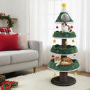 Multi-level green Christmas cat tree with plush platforms and decorations, perfect for festive feline fun and.