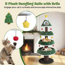 Multi-level green Christmas cat tree with plush dangling balls, perfect for festive play and cozy lounging for cats.