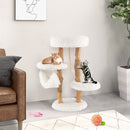 Wooden cat tree with jute scratching posts, featuring multiple tiers and cozy hammock for playful kittens.