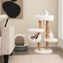 Wooden cat tree with jute scratching posts, featuring 5 tiers and cozy hammocks for playful kittens in a stylish living.