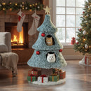 Christmas cat tree with frosted green plush, two condos, and a star topper, perfect for indoor feline fun.