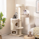 Multi-level cat tower with faux linen hammock, plush bed, and two condos for indoor cats to sleep and play.