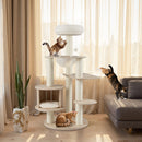 Cats playing on the multi-level 132 cm tall wooden cat tree, featuring a sturdy base and plush resting areas for.