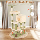 Multi-level cat tower in green with cozy hammock, large cat house, and sturdy frame for climbing and resting.