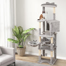 Multi-level cat tree with top perch, large condo, and hammock for comfortable lounging and scratching. Ideal for.