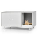Modern white cat litter box enclosure with divider, featuring a cozy space for cats and a stylish coffee table design.