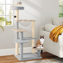 Multi-level modern cat tree with removable plush top perch and sisal scratching posts for feline entertainment.