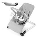 Foldable baby bouncer in grey with toy bar