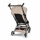 CYBEX Libelle 2026 Almond Beige rear view with red brake pedal