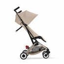 CYBEX Libelle 2026 Almond Beige side view with red brake pedal