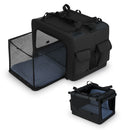 Folding soft dog crate with extendable mesh basket, multiple openings, and detachable shoulder straps for travel.