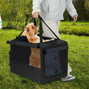 Folding soft dog crate in black with mesh windows, featuring an extendable basket, ideal for travel and outdoor use.