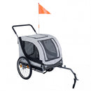 2-in-1 dog bike trailer in off-white with mesh windows, removable front wheel, and safety flag for versatile pet.