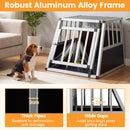 Travel dog crate with aluminum alloy frame, lockable door, and mesh panels for ventilation, designed for car transport.