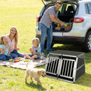 Travel dog crate with lockable doors and removable divider, made from durable aluminum for safe pet transport.