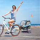 Folding pet bike trailer in blue with 3 zippered doors and reflectors, ideal for small to medium pets on bike rides.