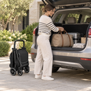 Rever Bebe Joy stroller in black — car boot folded lifestyle scene