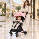 Rever Bebe Joy stroller in pink — shopping centre lifestyle scene