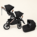 Rever Bebe VEVO Black – Two Seats with one Bassinet (plus bonus mummy bag and shopping basket) on an ivory studio background