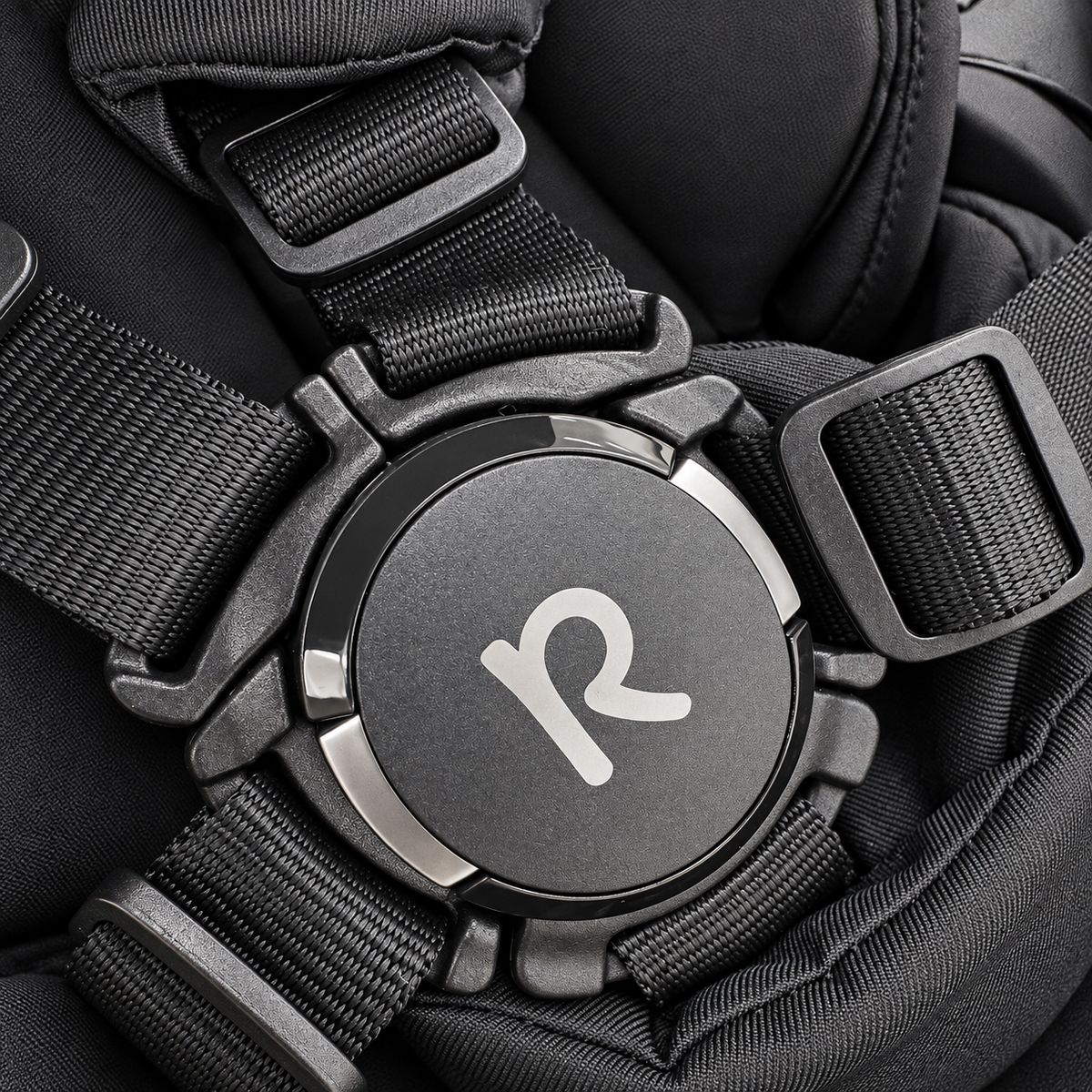 Actual VEVO circular harness buckle, R emblem, webbing and strap adjusters