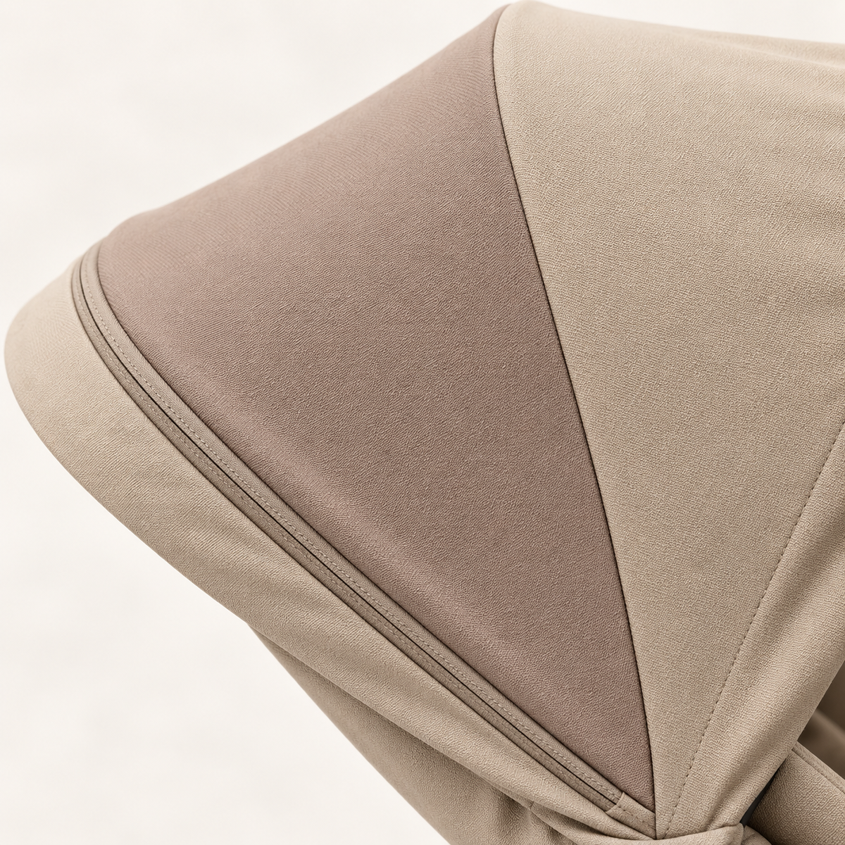 Close-up of Taupe VEVO canopy fabric, contrasting panel and stitched seam