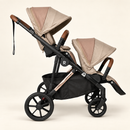 Rever Bebe VEVO Taupe – Two Seats on an ivory studio background
