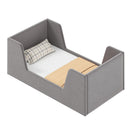 Grey upholstered toddler floor bed